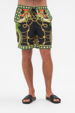 Crop view of model wearing Hotel Franks By CAMILLA mens walkshorts in Jealousy And Jewels print
