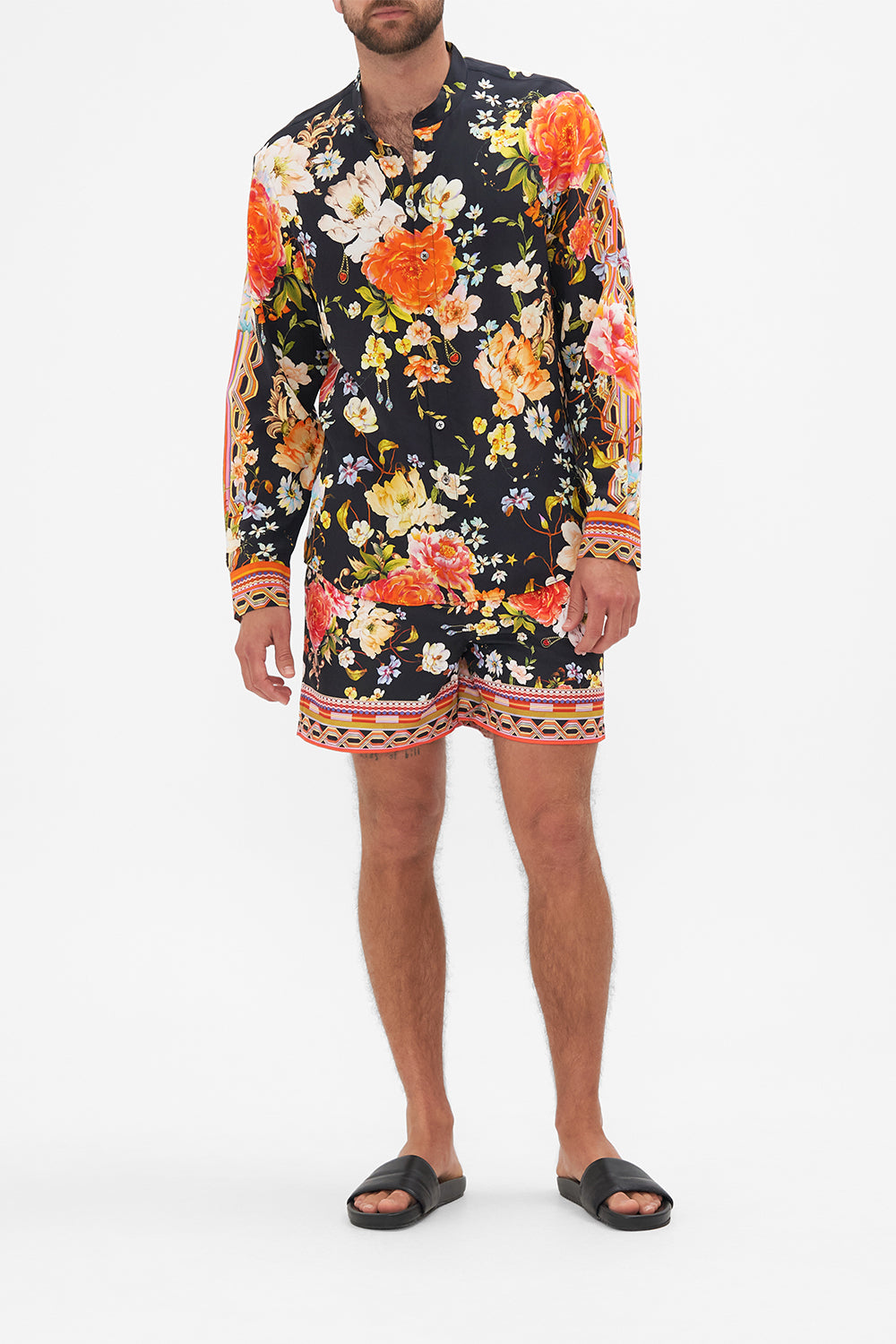 Front view of model wearing CAMILLA floral silk shirt in Secret History print