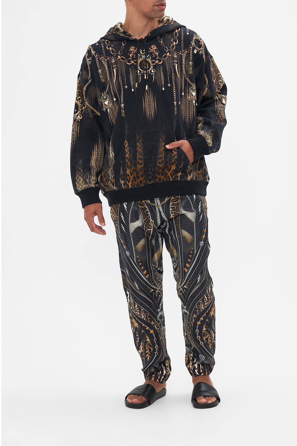 Front view of model wearing Hotel Franks by CAMILLA mens black oversized hoody in Jungle Dreaming print