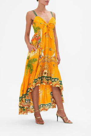Front view of model wearing CAMILLA orange silk dress in Dancing With The Bulls print