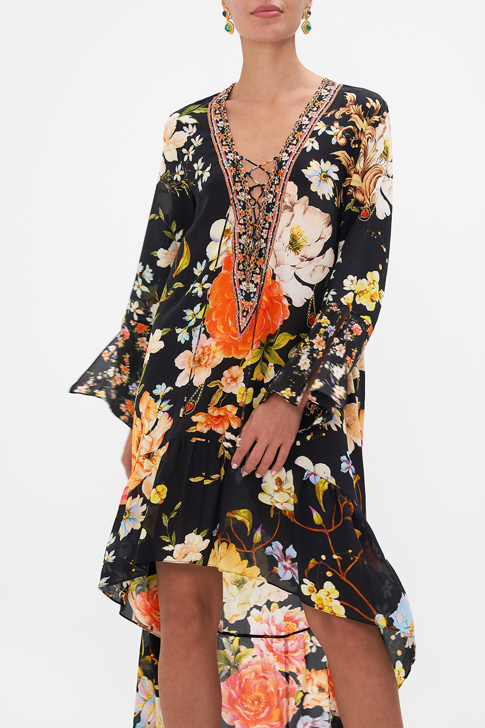 Crop view model wearing of CAMILLA floral silk dress in Secret History print