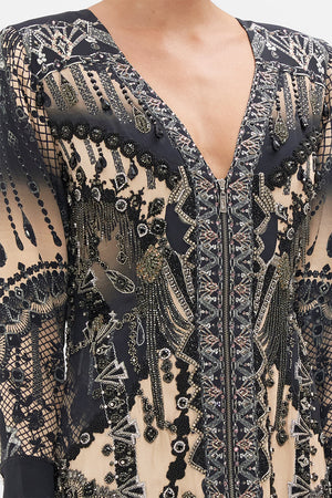 Detail view of model wearing CAMILLA silk maxi dress in Curtain Call Chaos print 