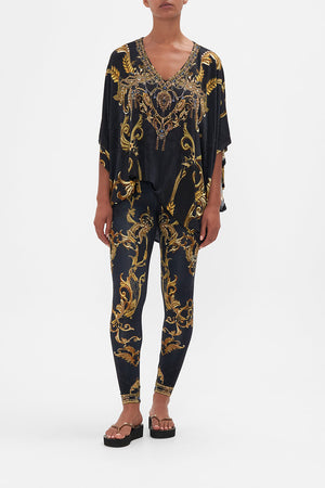 Front view of model wearing CAMILLA leggings in Moonlight Melodies print
