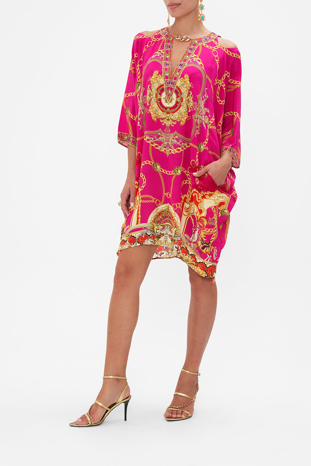 Side view of model wearing CAMILLA pink silk kaftan in Wild And Running print 