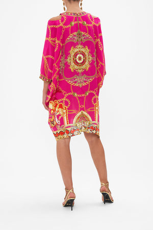 Back view of model wearing CAMILLA pink silk kaftan in Wild And Running print 