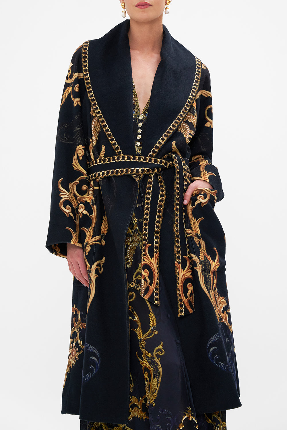 Crop view of model wearing CAMILLA long wool coat in Moonlight Melodies print