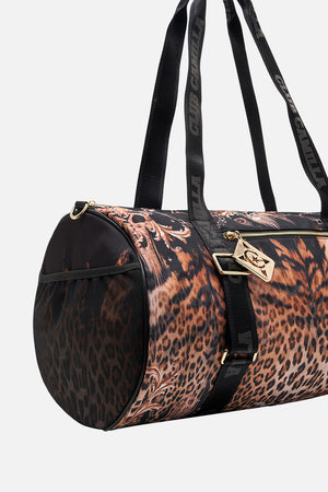 Detail view of CAMILLA leopard print gym bag in Running in The Wild print
