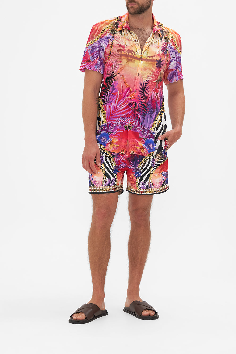 Front view of model wearing Hotel Franks by CAMILLA mens tropical short sleeve button through shirt in Wild Loving print