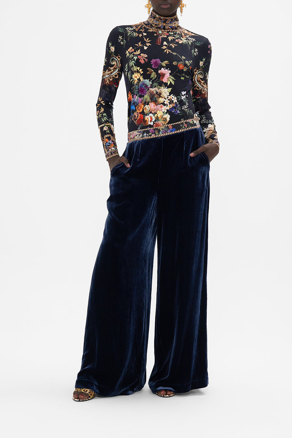 Front view of model wearing CAMILLA black jersey turtleneck in Play Your Cards Right print