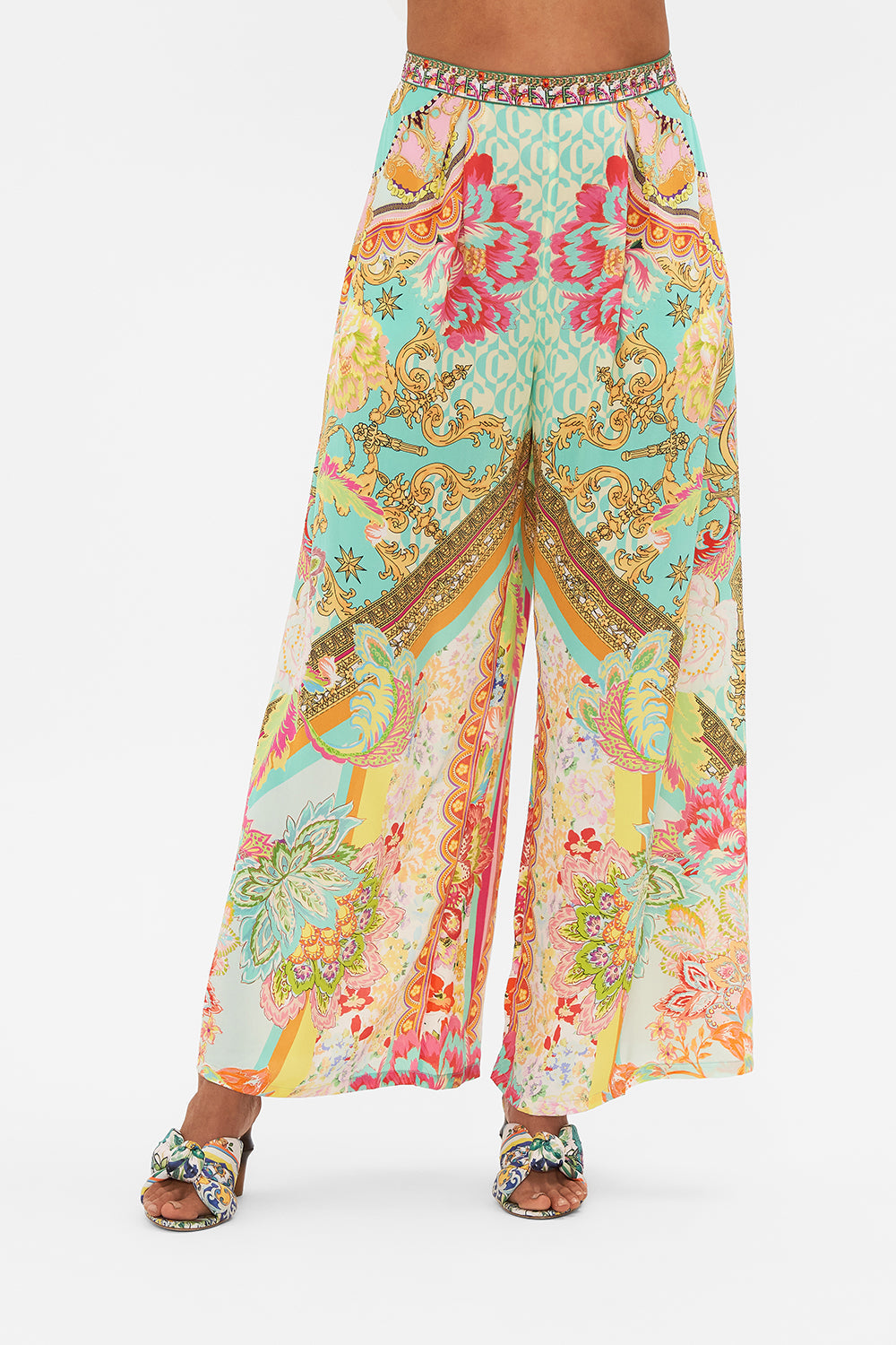 Crop view of model wearing CAMILLA silk tuck front pant in An Italian Welcome print