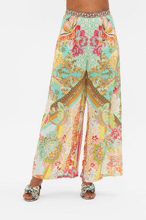Crop view of model wearing CAMILLA silk tuck front pant in An Italian Welcome print