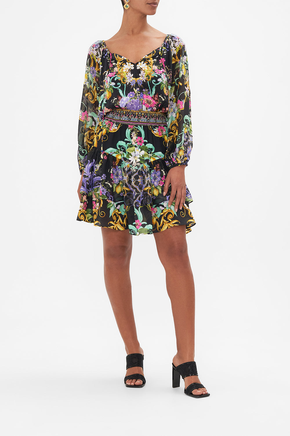 Front view of model wearing CAMILLA black floral mini dress in Meet Me In Marchesa print