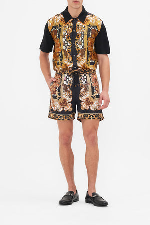 Front view of model wearing Hotel Franks by CAMILLA mens boardshorts in Feeling Fresco print
