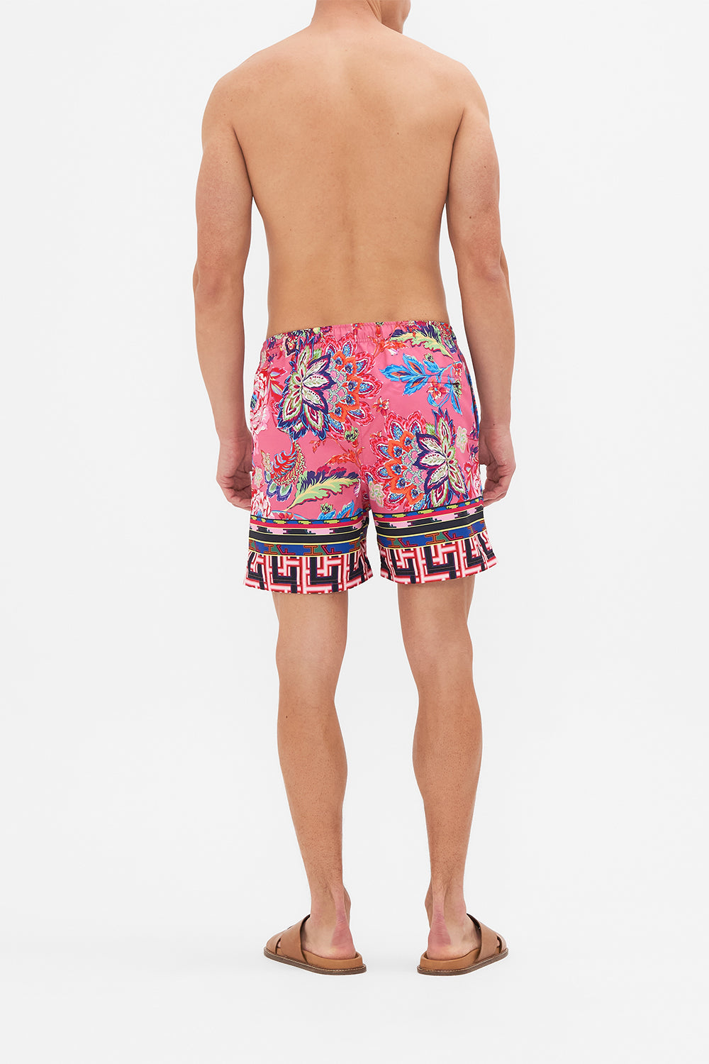 Back view of model wering HOTEL FRANKS BY CAMILLA mens boardshort in Rome Retro print