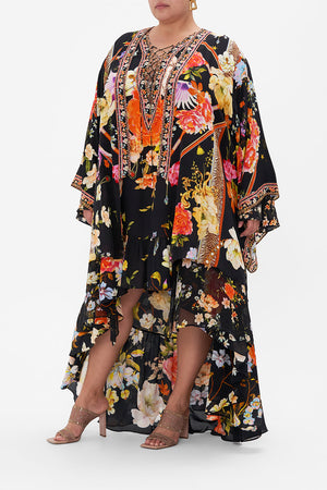 Front view of  curvy model wearing CAMILLA plus size silk floral kimono in Secret History print 