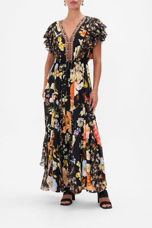 Front view of model wearing CAMILLA silk ruffle maxi dress in Secret History floral print