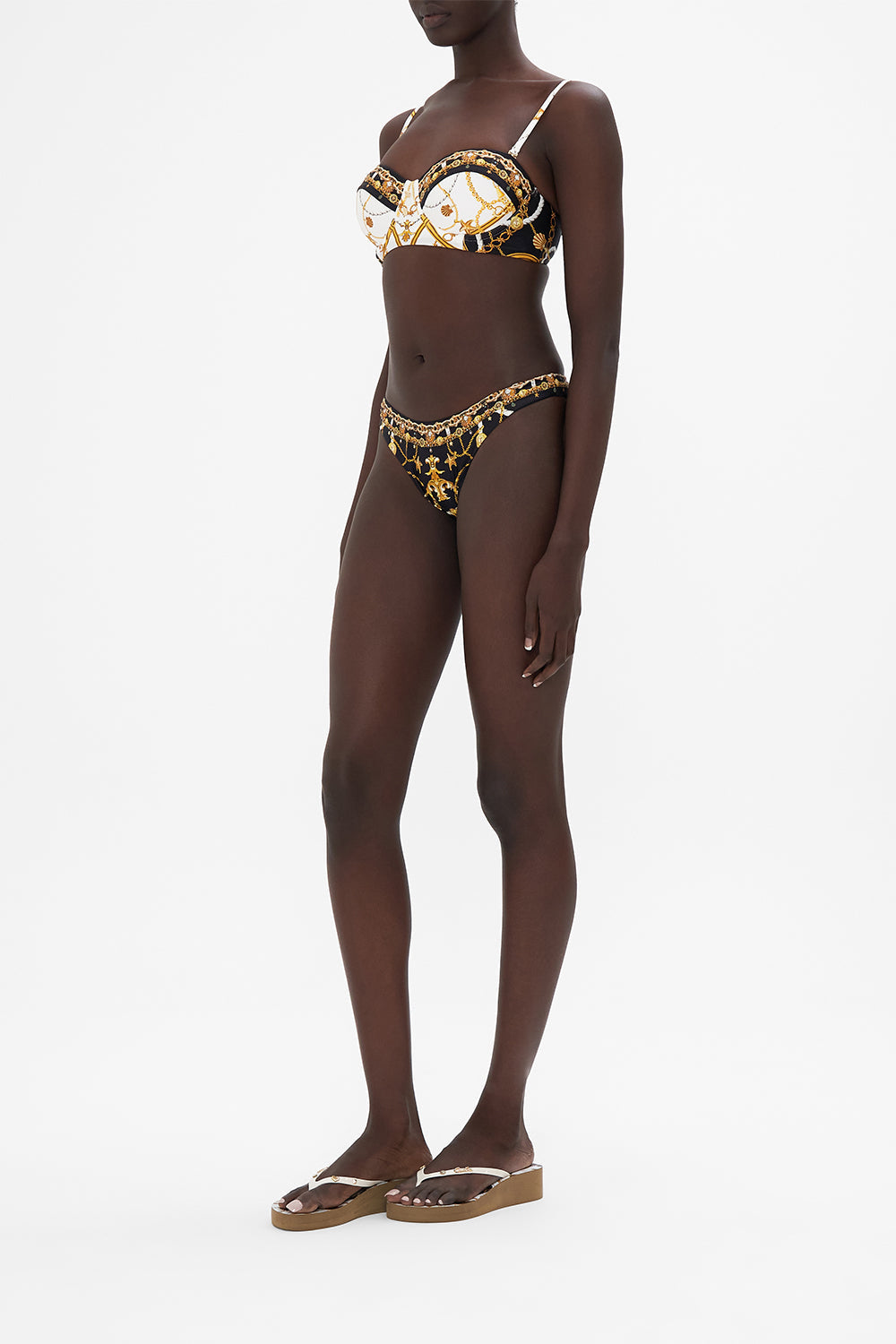 Side view of model wearing CAMILLA balconette underwire bra in Coast to Coast print