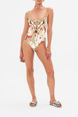 Front view of model wearing CAMILLA designer one piece swimsuit in Saluti Summertime print