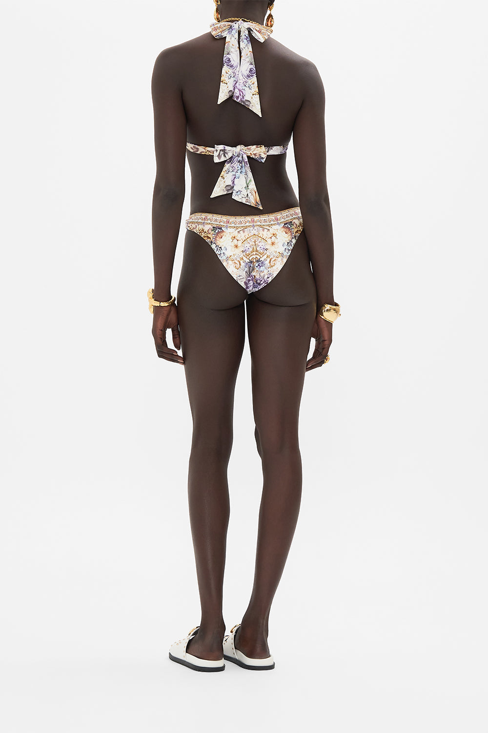 Back view of model wearing CAMILLA designer bikini in Sail Away With Me print