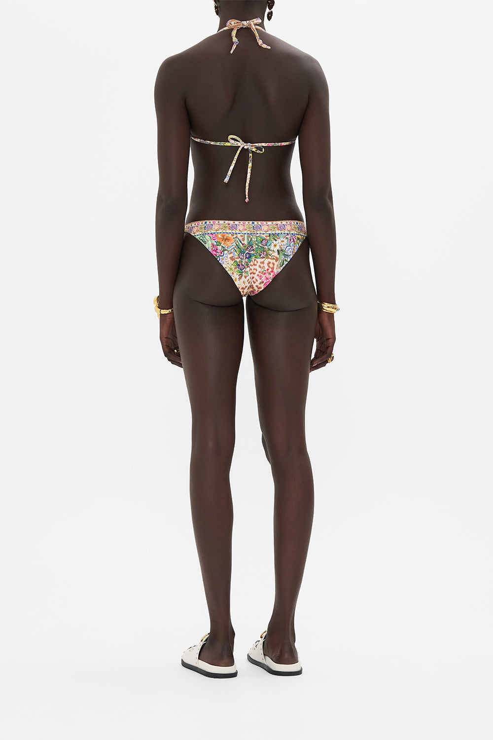 Back view of model wearing CAMILLA resortwear floral bikini Flowers of Neptune print 