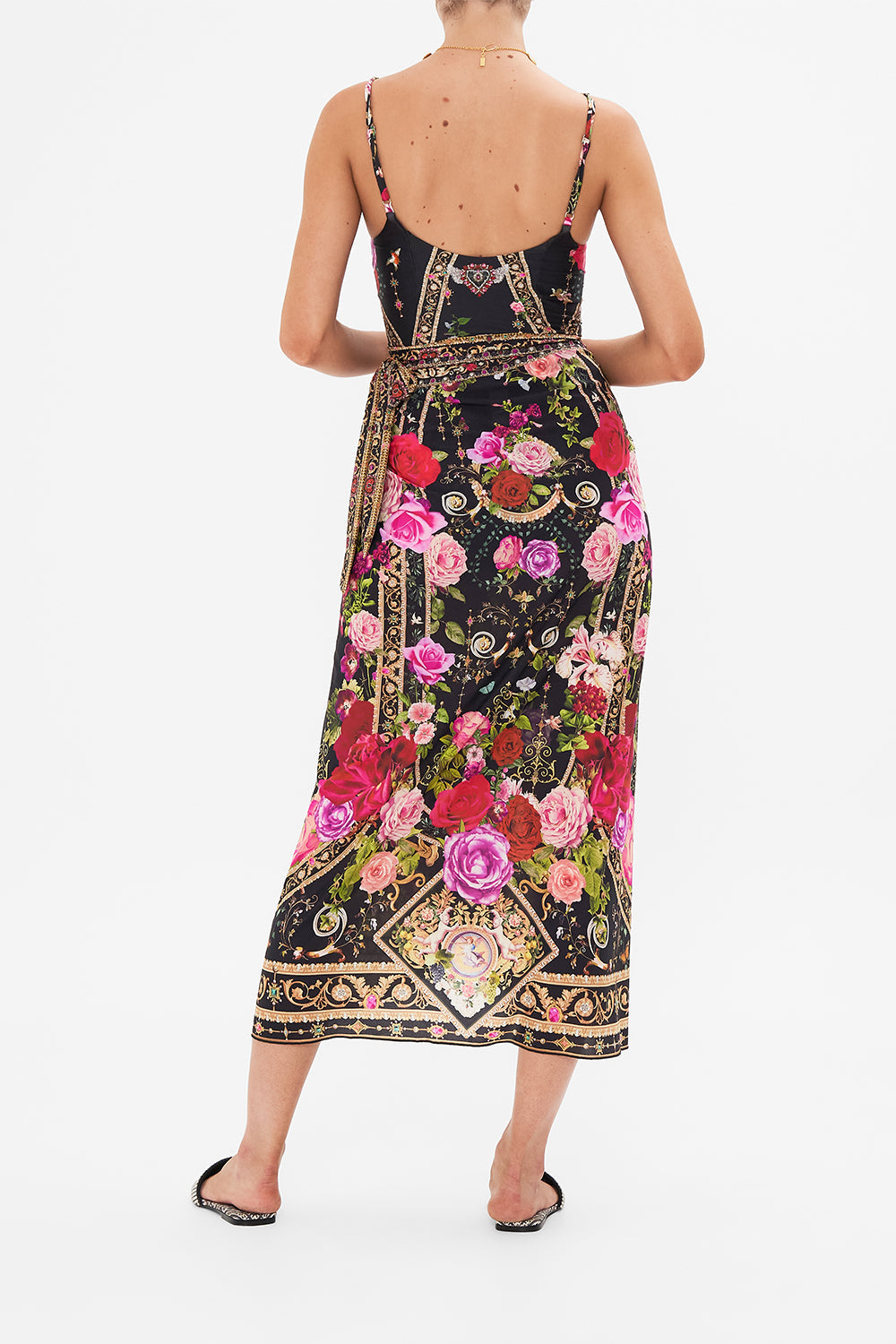 Back view of model wearing CAMILLA resortwear draped sarong in Reseravtion For Love print