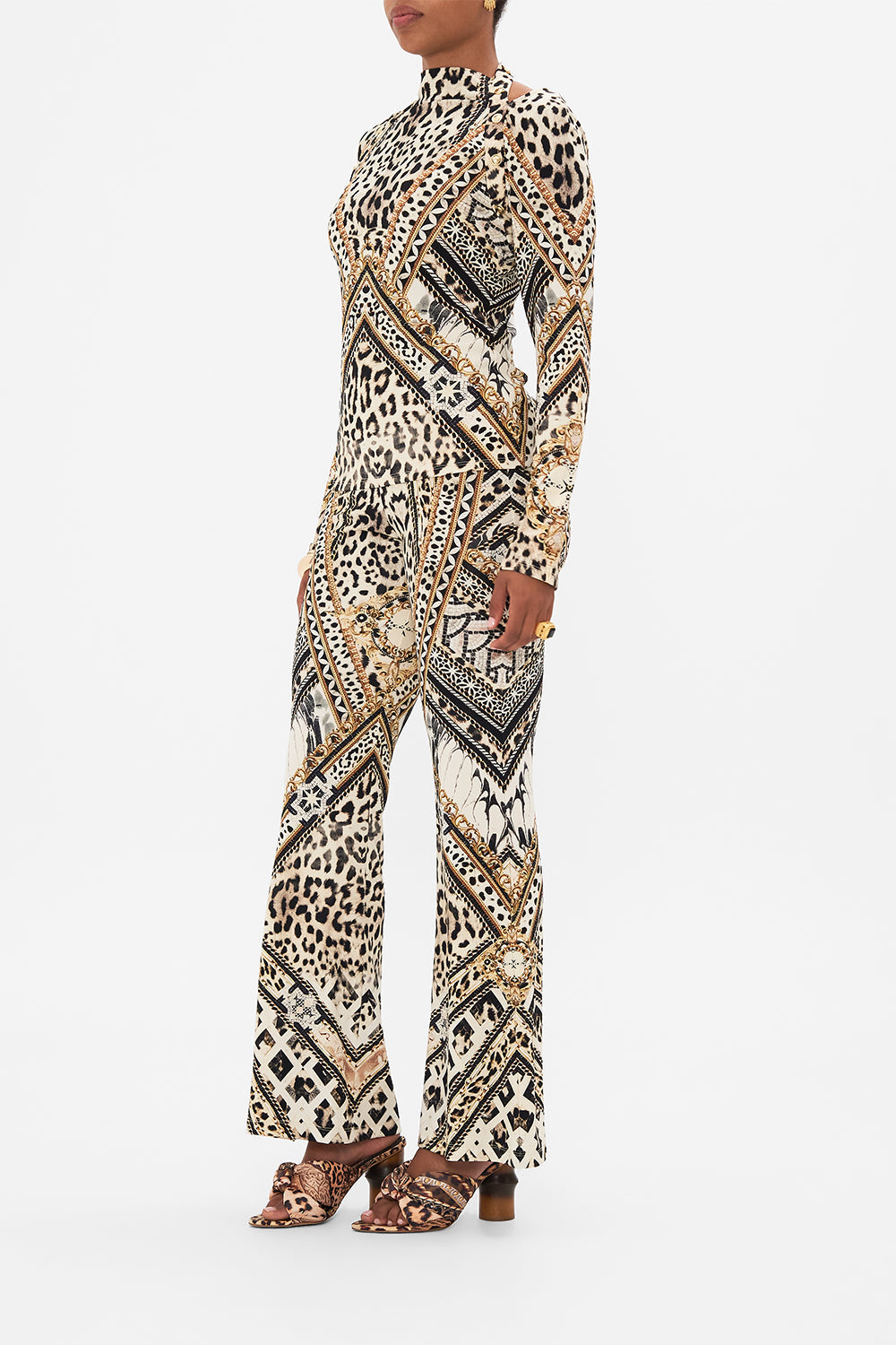 Side view of model wearing CAMILLA animal print top in Mosaic Muse print