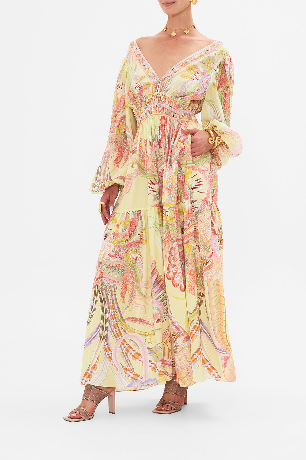 Side view of model wearing CAMILLA long sleeve silk dress in Cosmic Tuscan print
