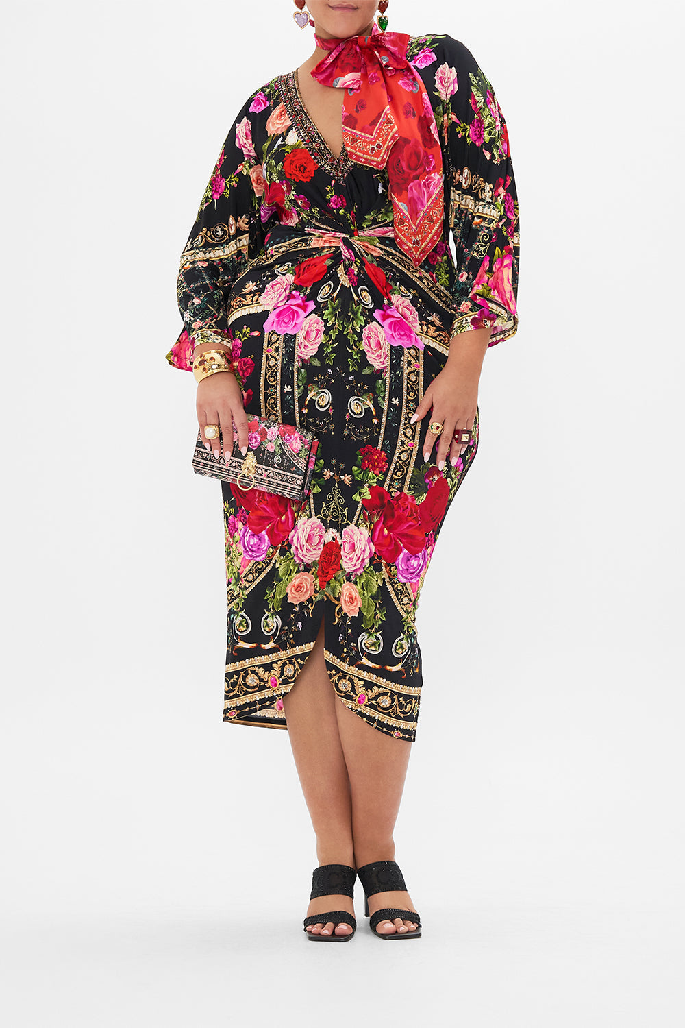 Front view of curvy model wearing CAMILLA plus size floral midi dress in Reservation For Love print