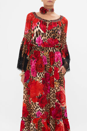 Crop view of model wearing CAMILLA floral silk maxi drress in Heart Like A Wildflower print 