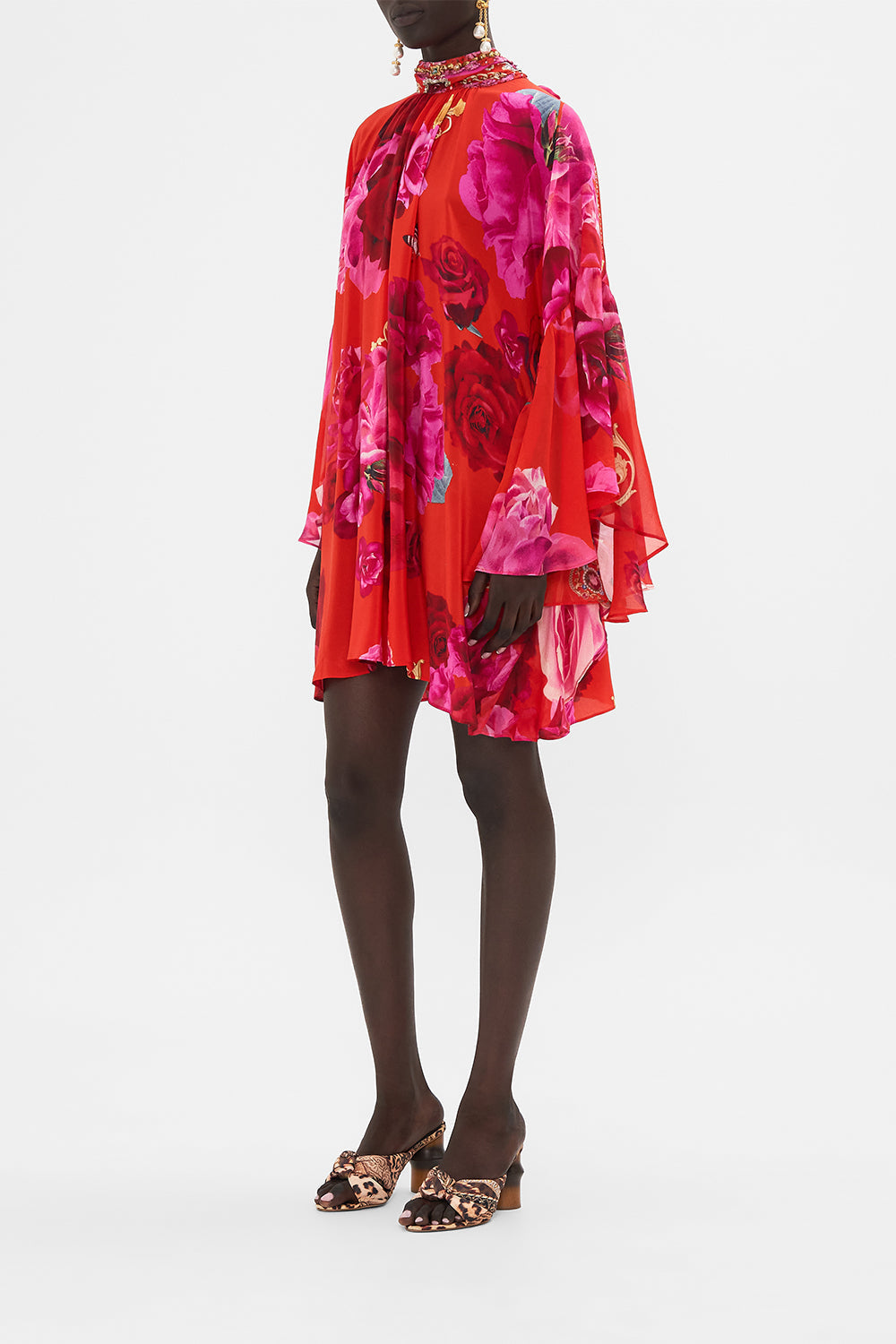 Side view of model wearing CAMILLA high neck silk dress in An Italian Rosa print