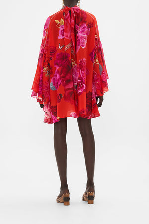 Back view of model wearing CAMILLA high neck silk dress in An Italian Rosa print