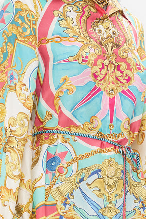 Detail view of model wearing CAMILLA silk shirtdress in Sail Away With Me print