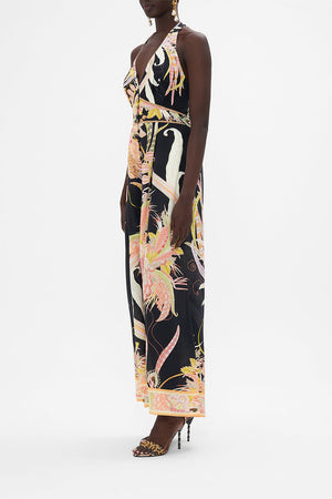 Side view of model wearing CAMILLA silk jumpsuit in Lady of The Moon print