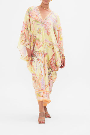 Front view of model wearing CAMILLA designer silk floral kaftan in Cosmic Tuscan print
