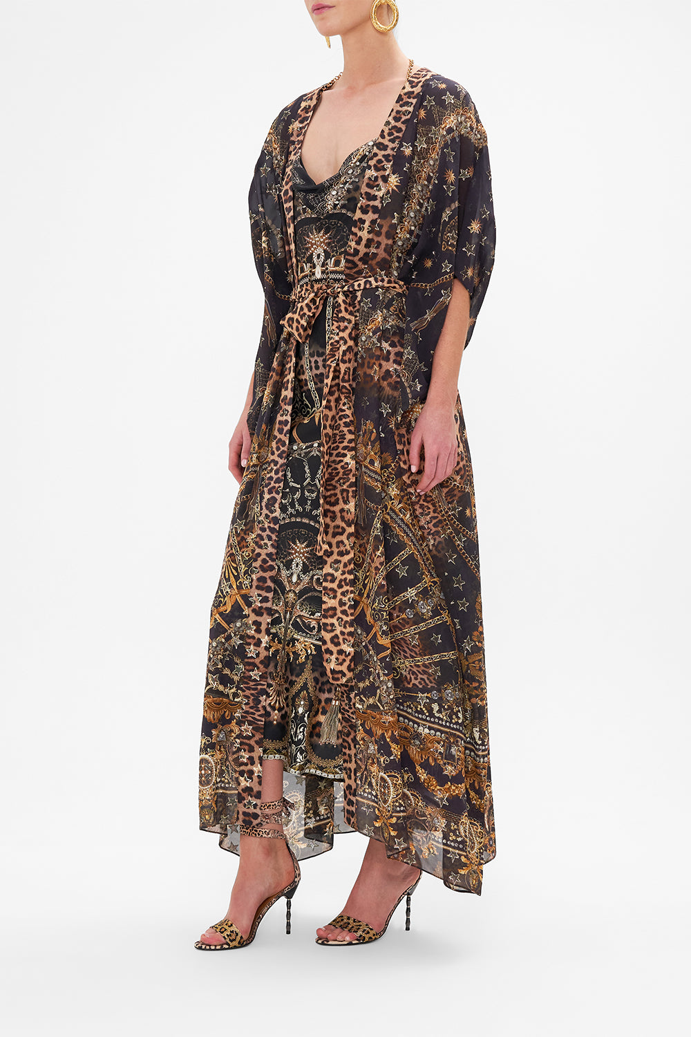 Side view of model wearing CAMILLA lurex outerwear layer in Masked Moonlight print