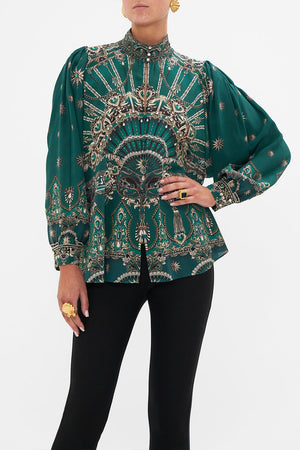 Crop view of model wearing CAMILLA silk blouse in A Venice Veil print