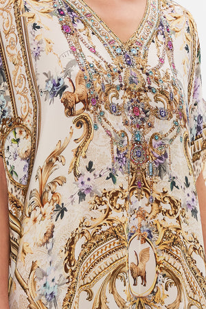 Detail view of model wearing CAMILLA resortwear silk kaftan in Palazzo playdate print 