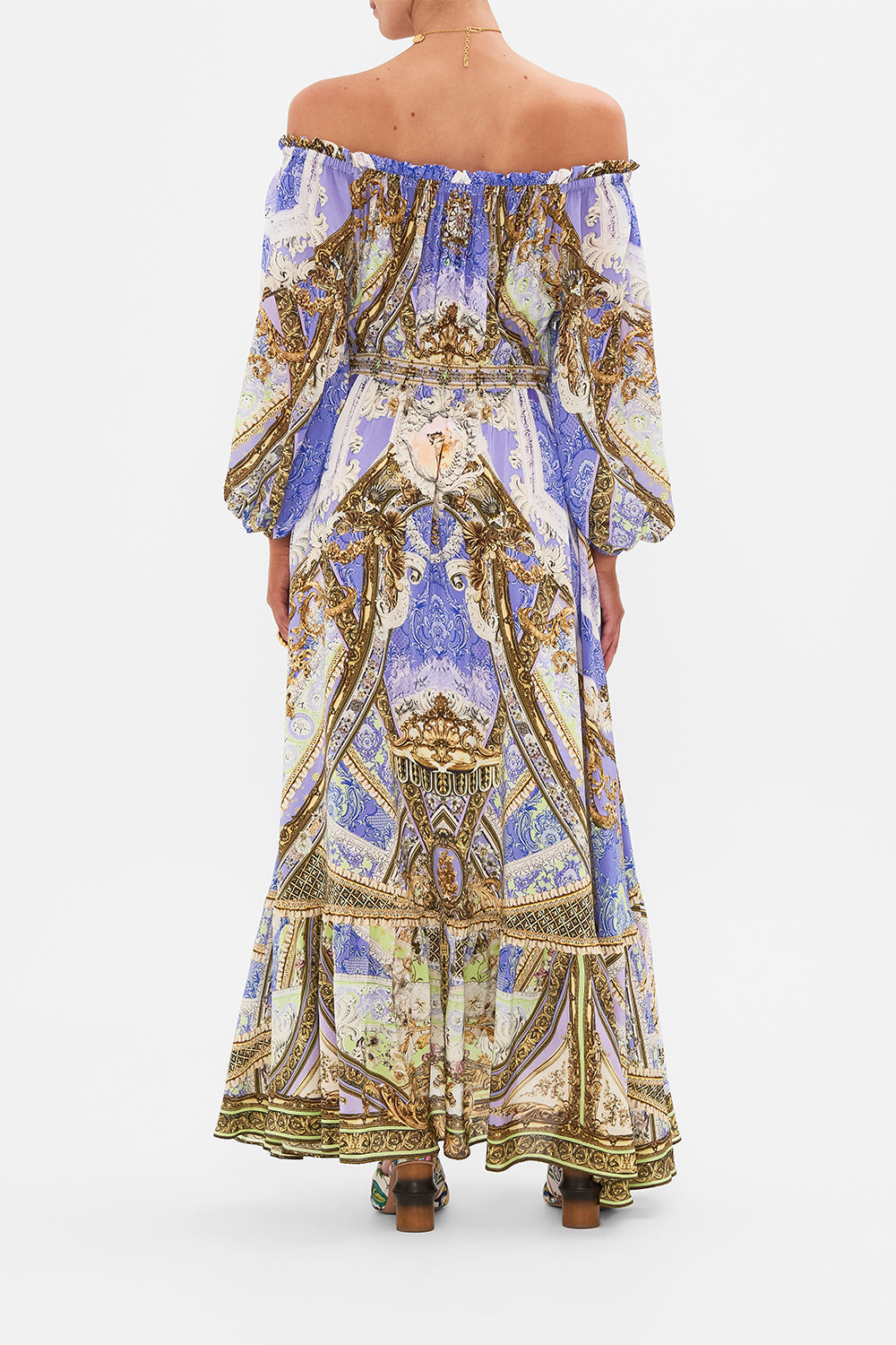 Back view of model wearing CAMILLA frill off the shoulder dress in Guilded Pleasures print 