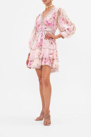 Side view of model wearing CAMILLA pink silk dress in Fresco Fairytale print