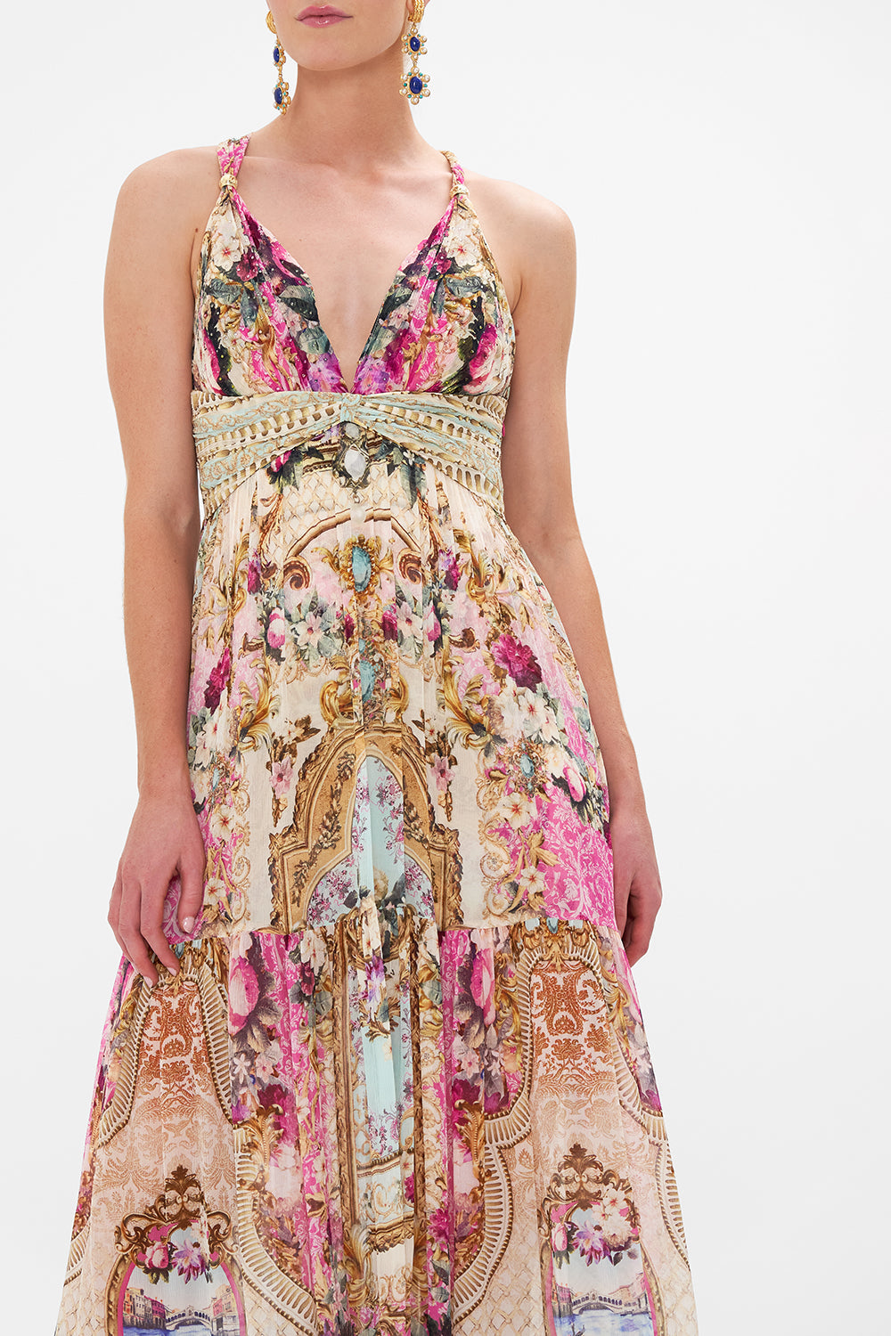 Crop view of model wearing CAMILLA pink silk dress in Call of the Canal print 