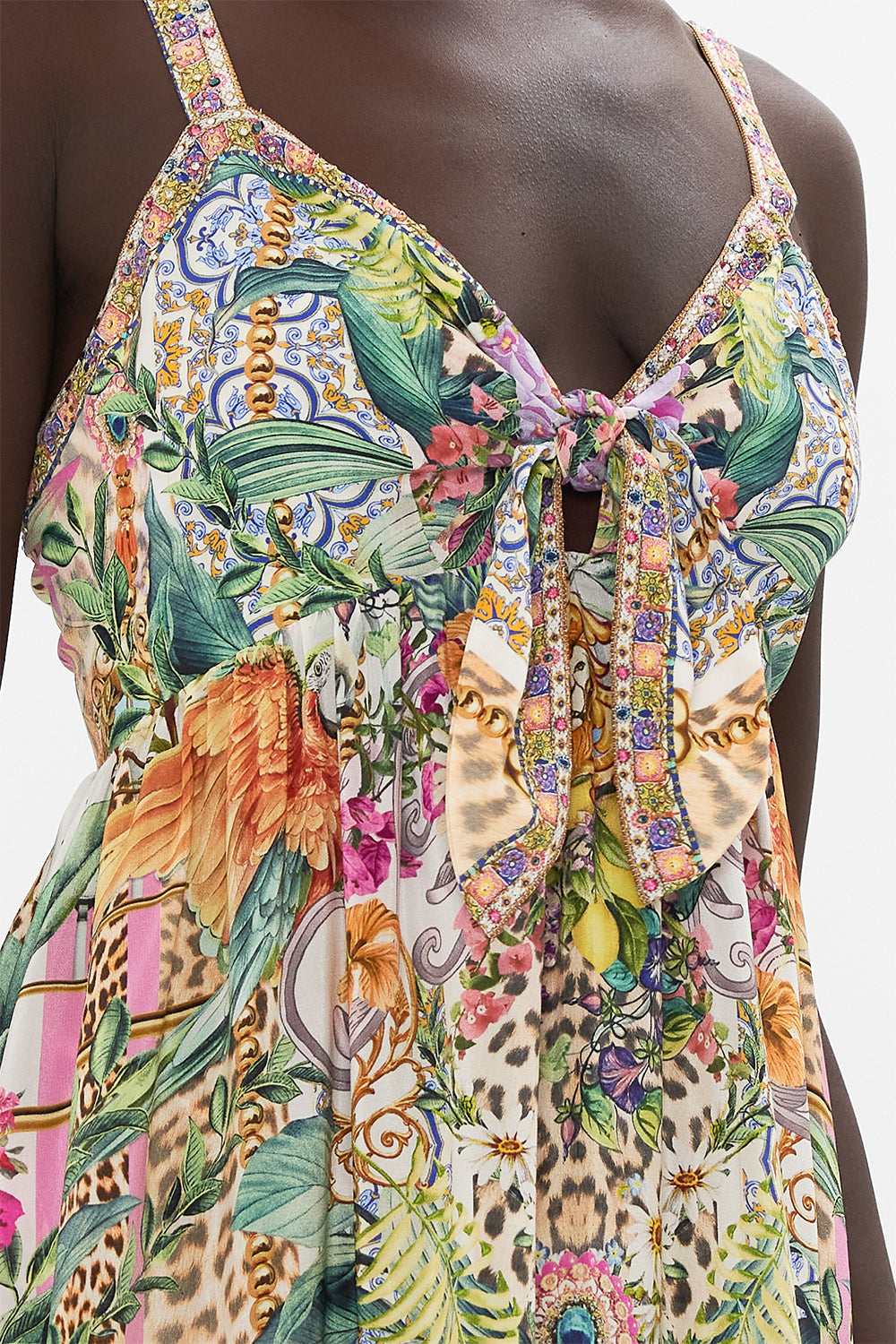 Detail view of model wearing CAMILLA floral silk dress in Flowers Of Neptune print
