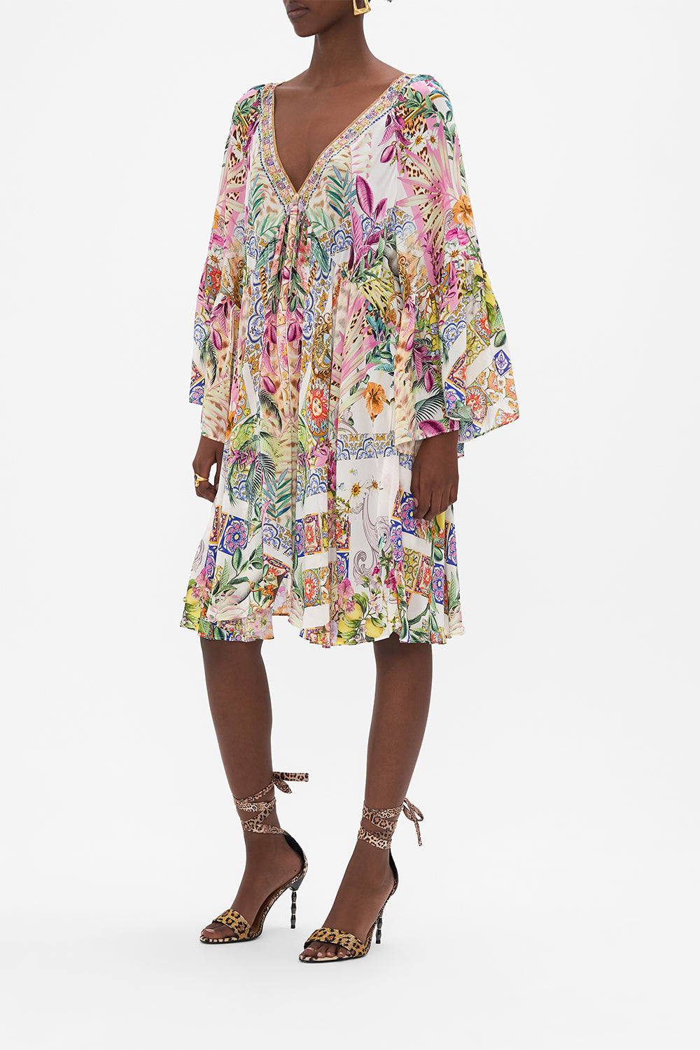 Side view of model wearing CAMILLA a line floral dress in Flowers Of Neptune print