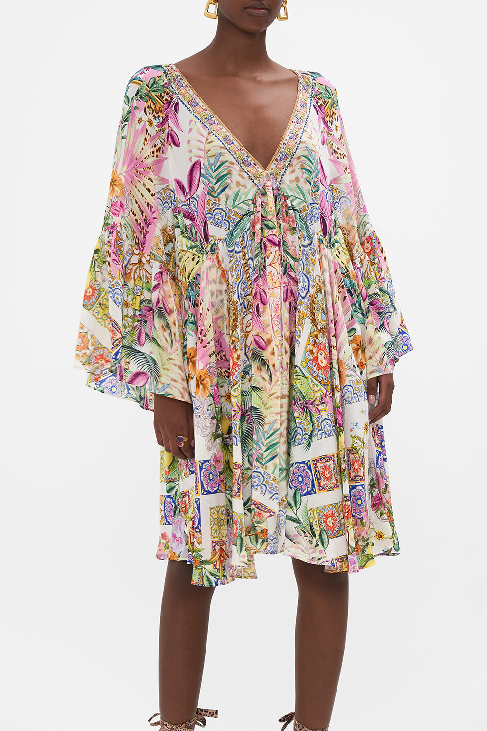 Crop view of model wearing CAMILLA a line floral dress in Flowers Of Neptune print