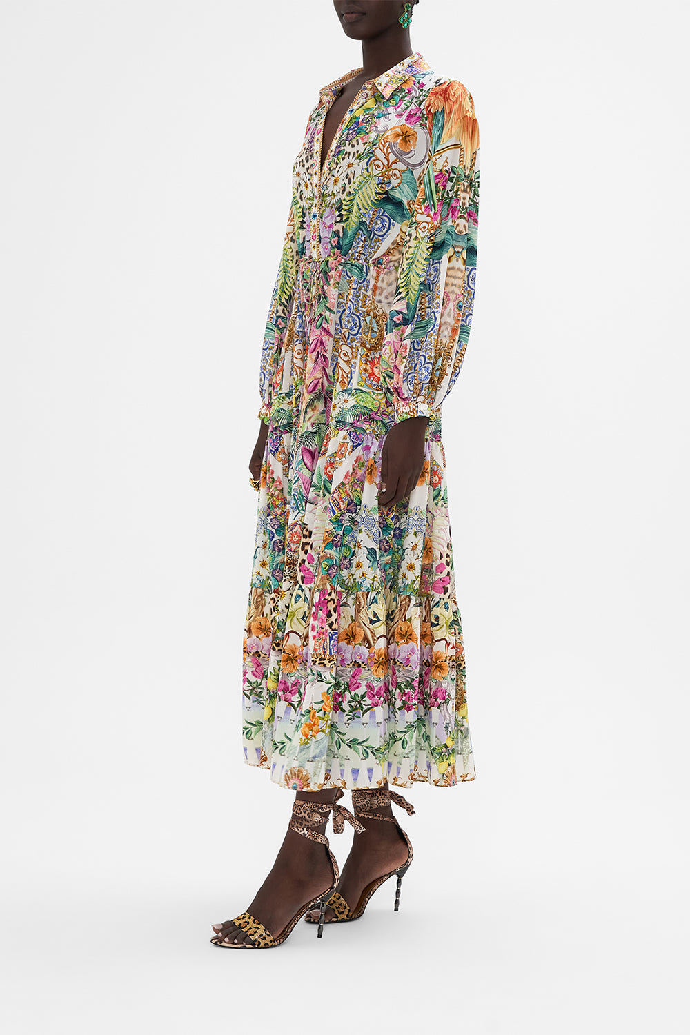 Side view of model wearing CAMILLA maxi shirt dress in Fkowers Of Neptune print