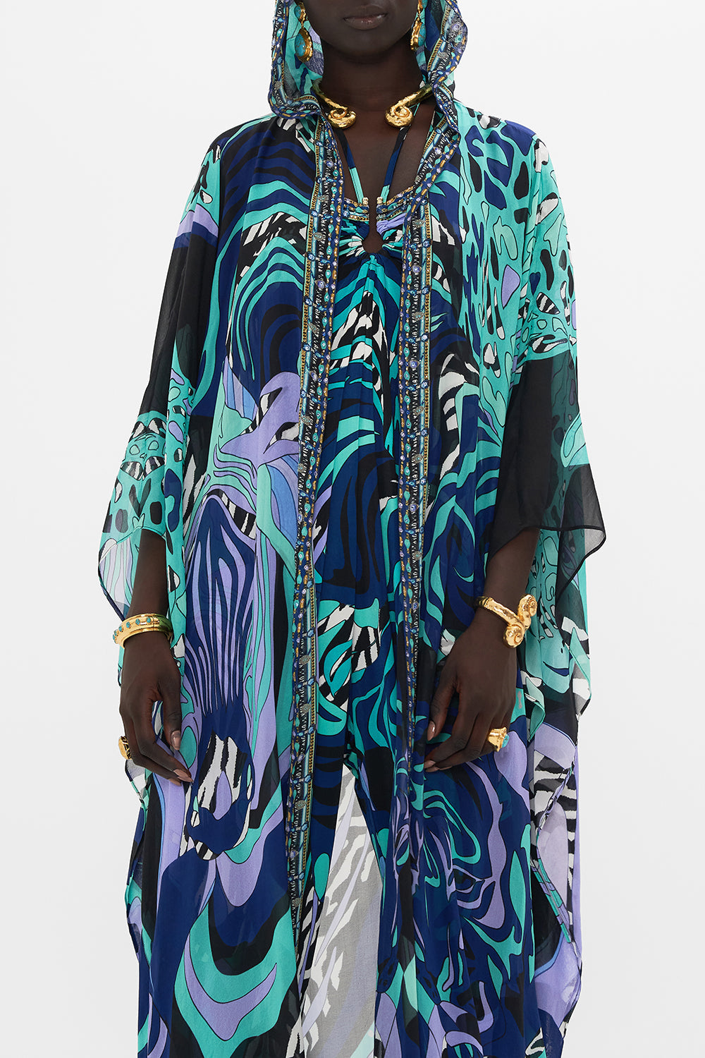 Crop view of model wearing CAMILLA silk robe in Vividly Venice print