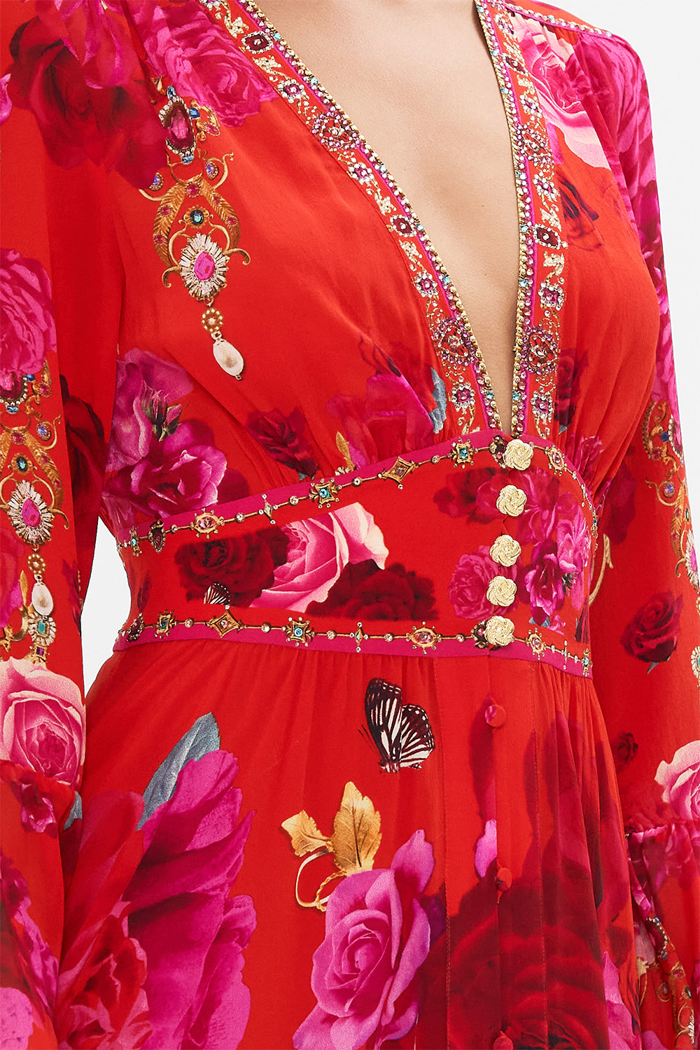 Detail view of model wearing designer floral ruffle dress in An Italian Rosa print 