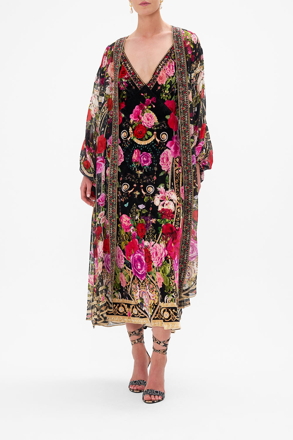 Front view of model wearing CAMILLA silk kimono layer in Reservation For Love print 