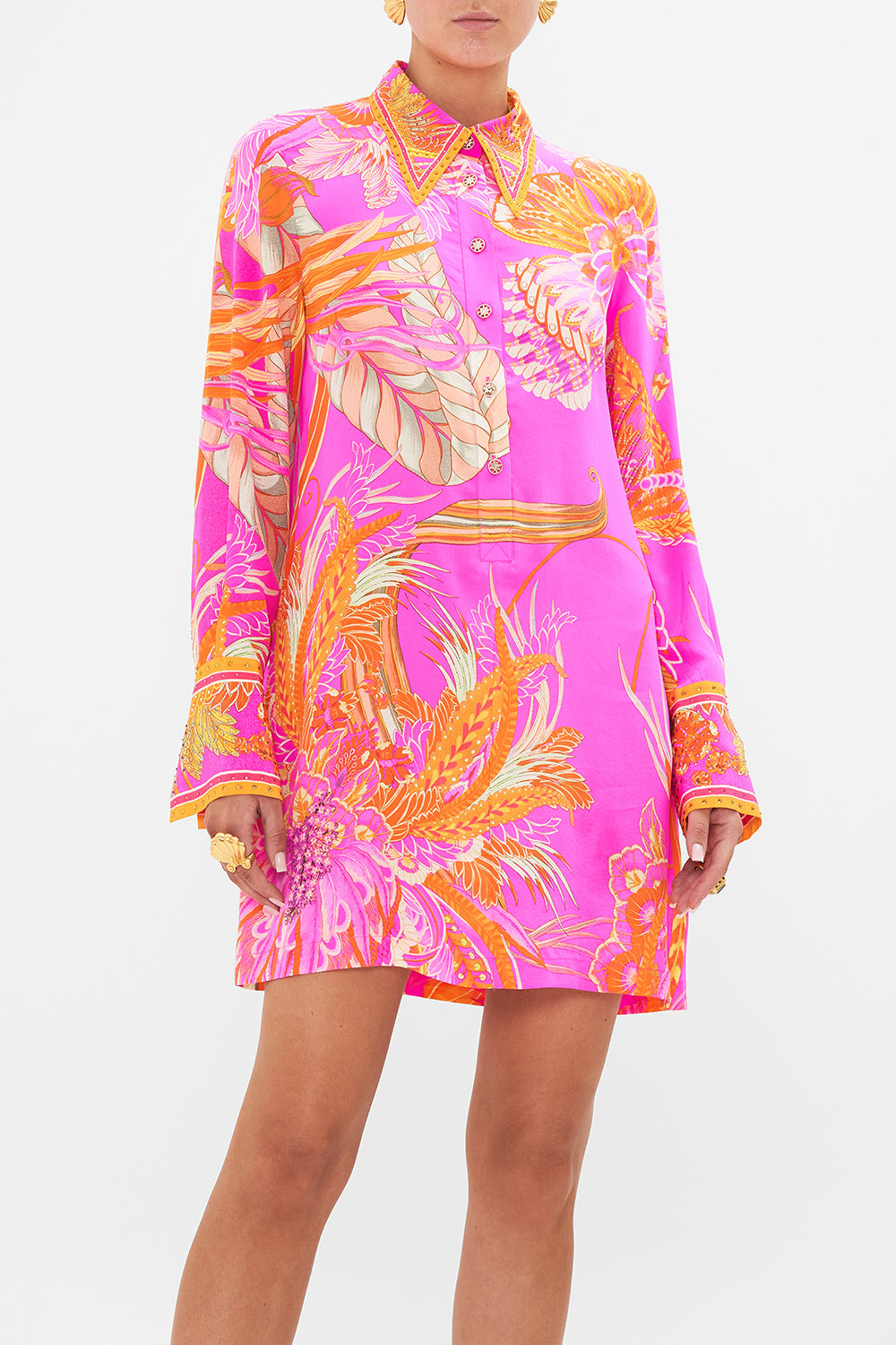 Crop view of model wearing CAMILLA silk shirt dress in A Heart That Flutters print