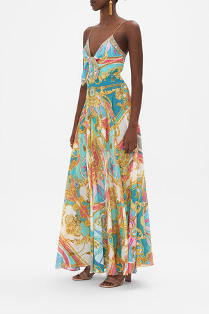 Side view of model wearing CAMILLA maxi dress in Sail Away With Me print