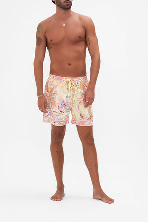 Front view of model wearing Hotel Franks by CAMILLA mens luxury boardshorts in Cosmic Tuscan print